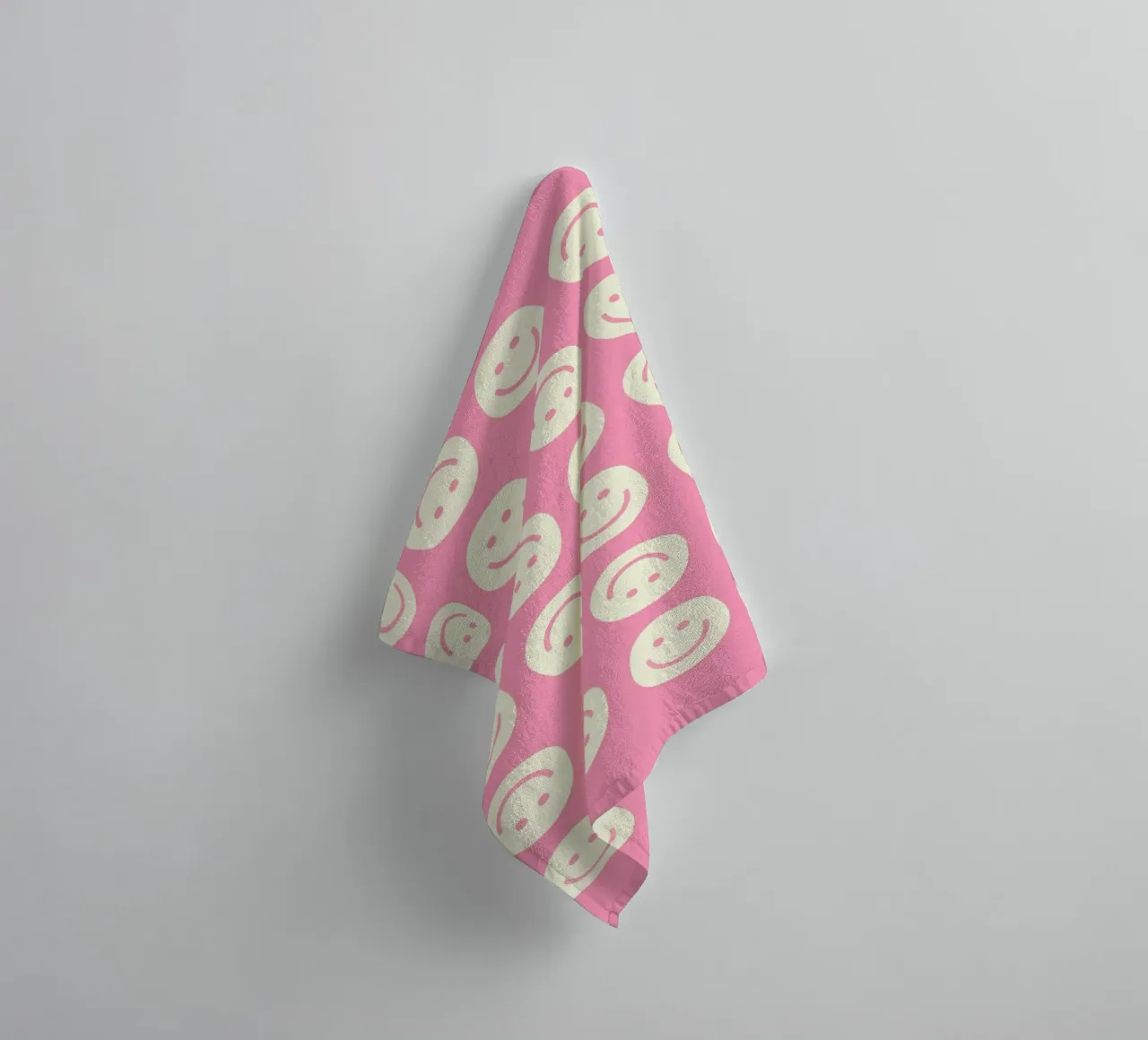 Pink Smiley towel by Attaboy Dsgn