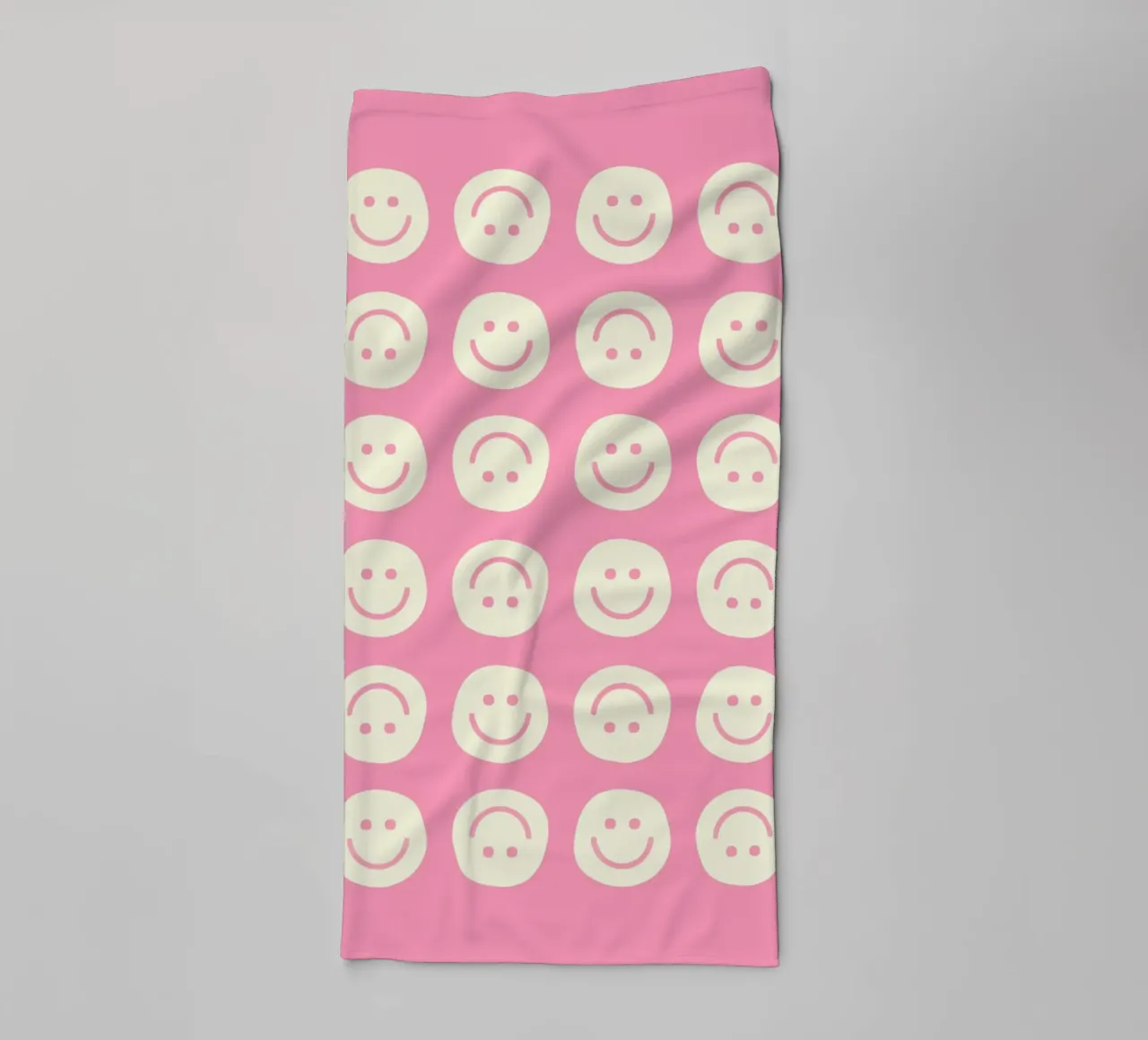 Pink Smiley towel by Attaboy Dsgn
