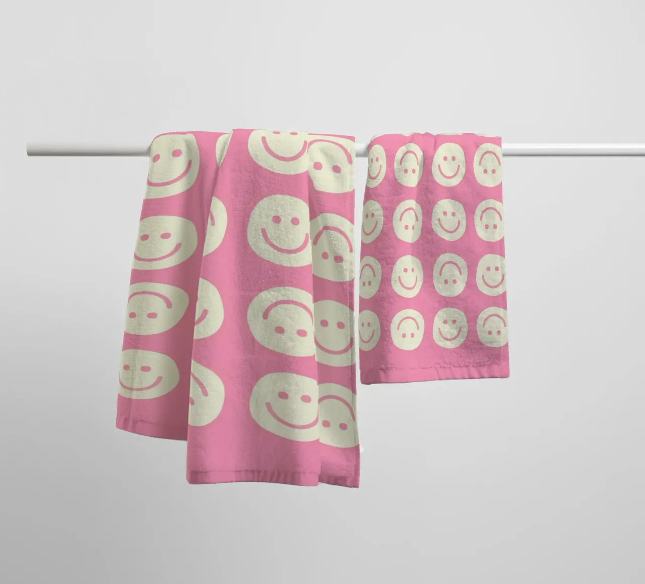Pink Smiley towel by Attaboy Dsgn