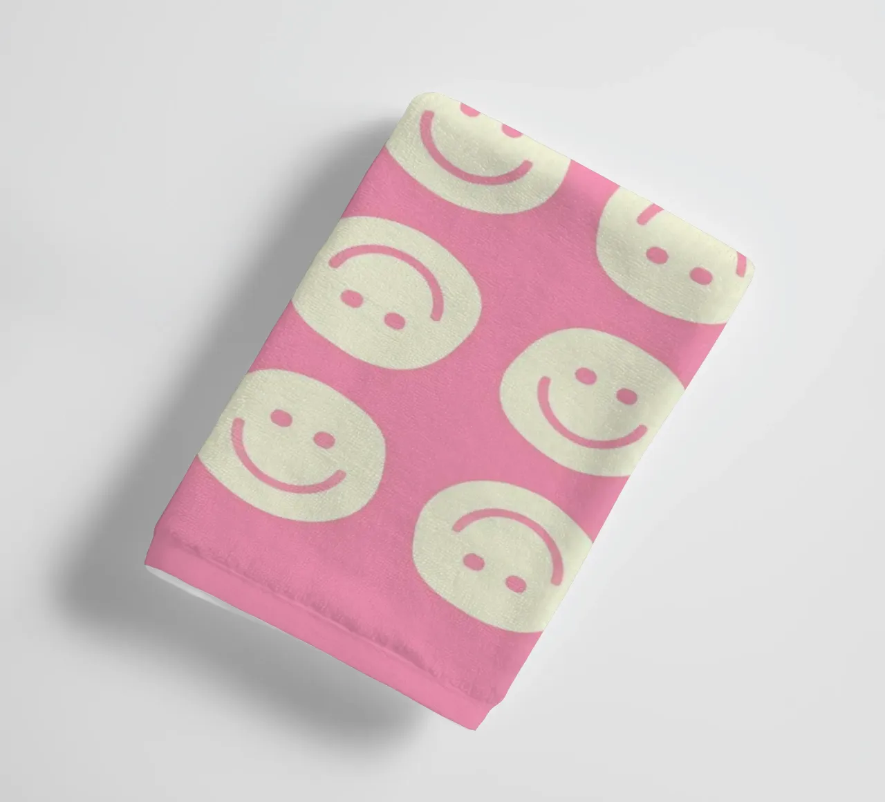 Pink Smiley towel by Attaboy Dsgn