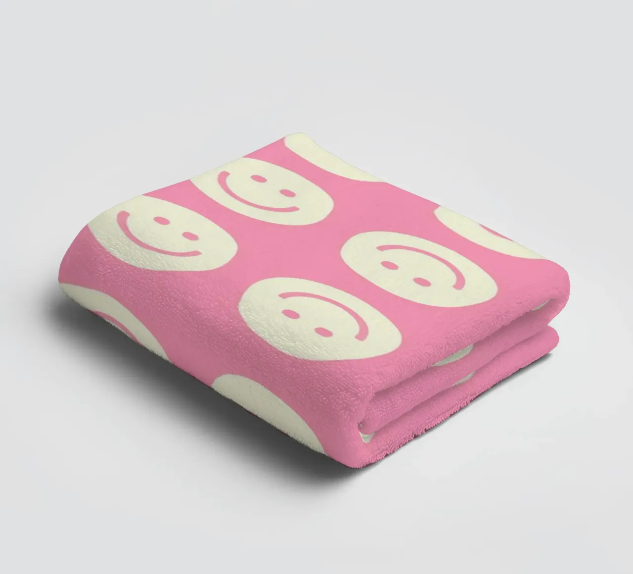 Pink Smiley towel by Attaboy Dsgn