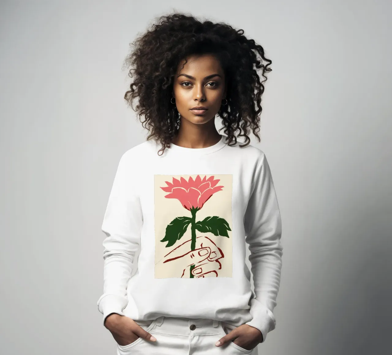 Hand met roze bloem sweatshirt van Lyra Glaze