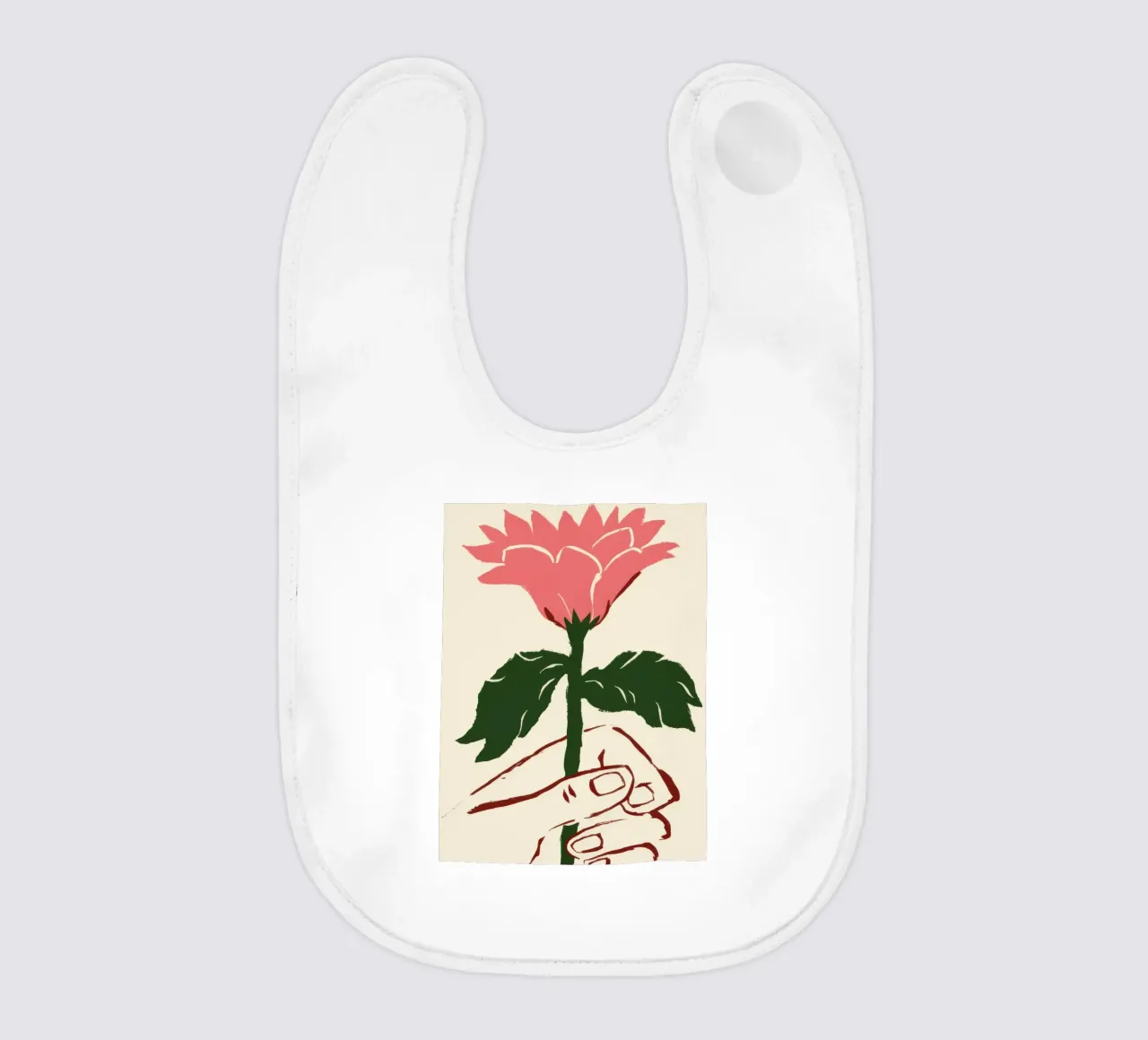 Mano che tiene un fiore rosa bavaglino da Lyra Glaze