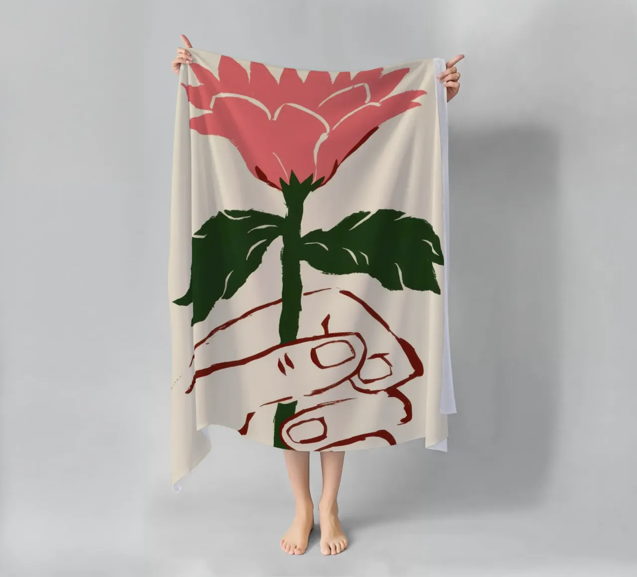 Mano che tiene un fiore rosa telo mare da Lyra Glaze