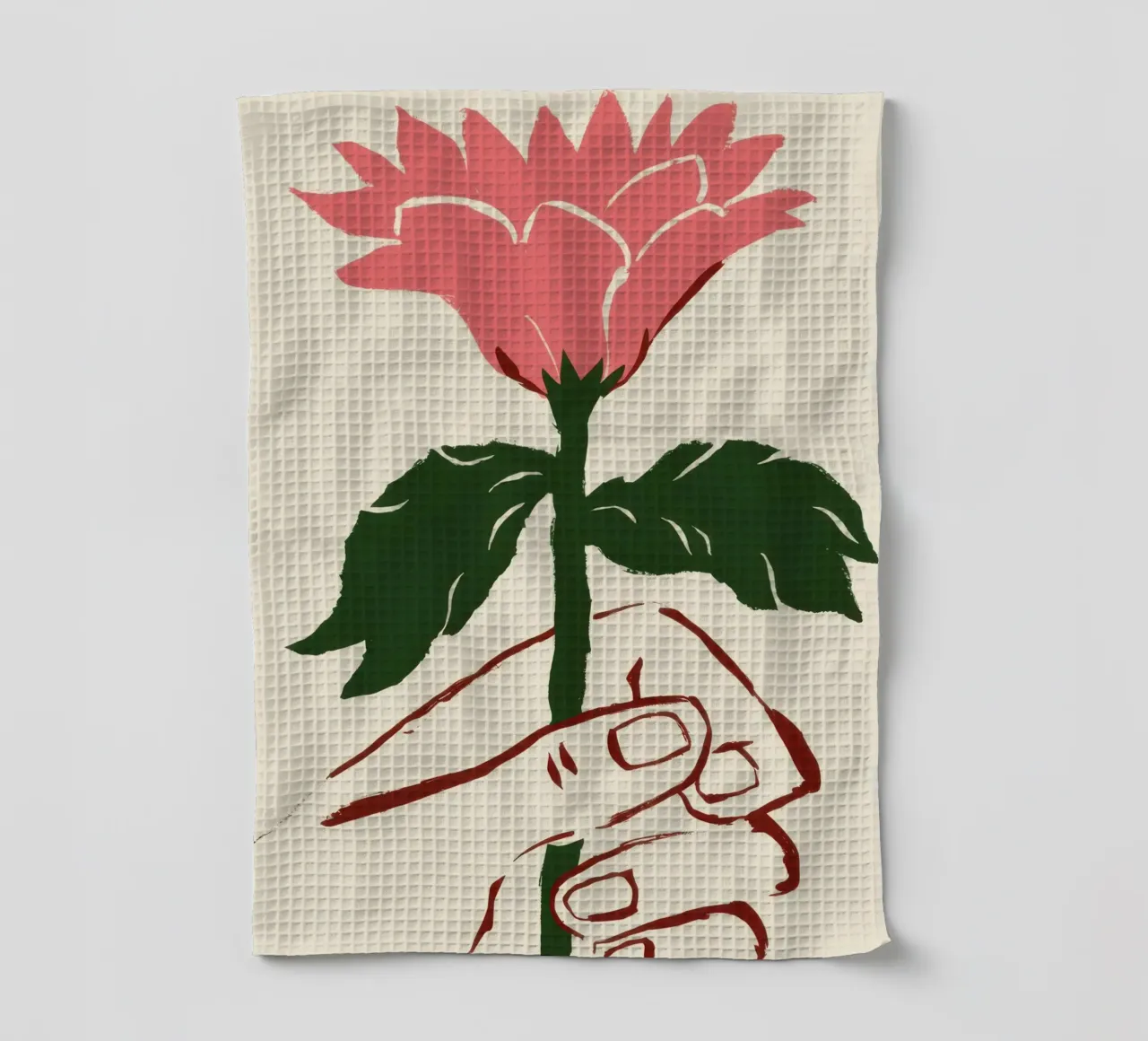 Mano che tiene un fiore rosa canovaccio da cucina da Lyra Glaze