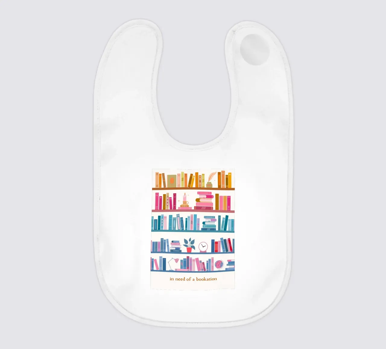 "In Need of a Bookation" - Colorful Bookshelf Art Print baby bib by vintagepod