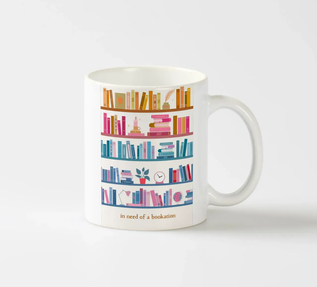 "In Need of a Bookation" - Colorful Bookshelf Art Print ceramic mug by vintagepod