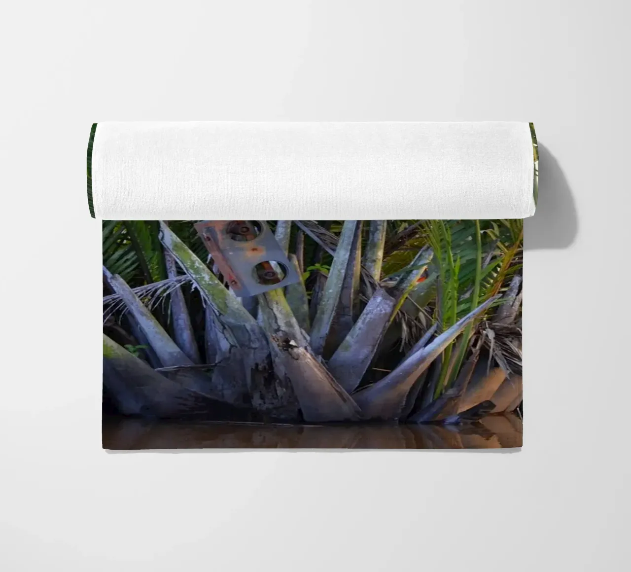 Speaker caught in Nipa Palm in the Klias Peninsula beach towel by byrieneke