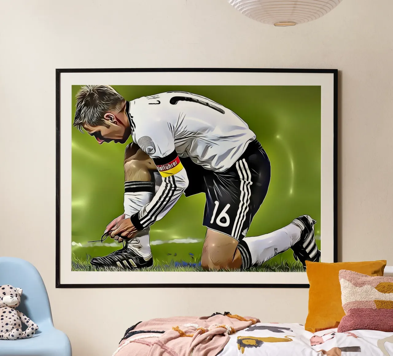 Il capitano della nazionale tedesca Philipp Lahm si allaccia i lacci delle scarpe poster da dark eagle