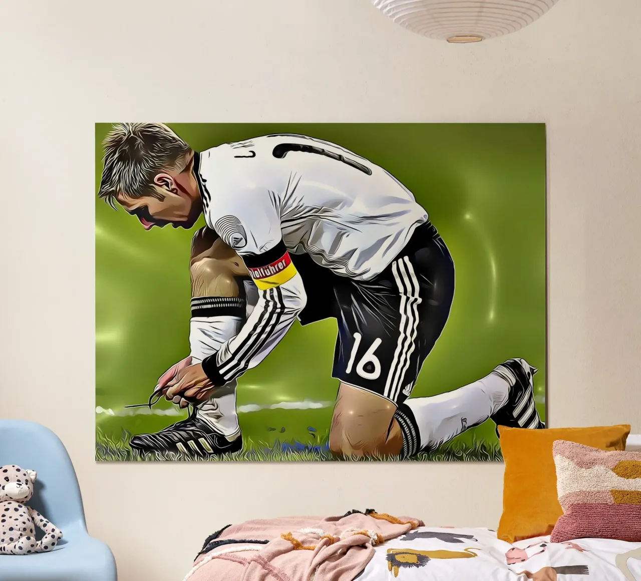 Il capitano della nazionale tedesca Philipp Lahm si allaccia i lacci delle scarpe poster da dark eagle
