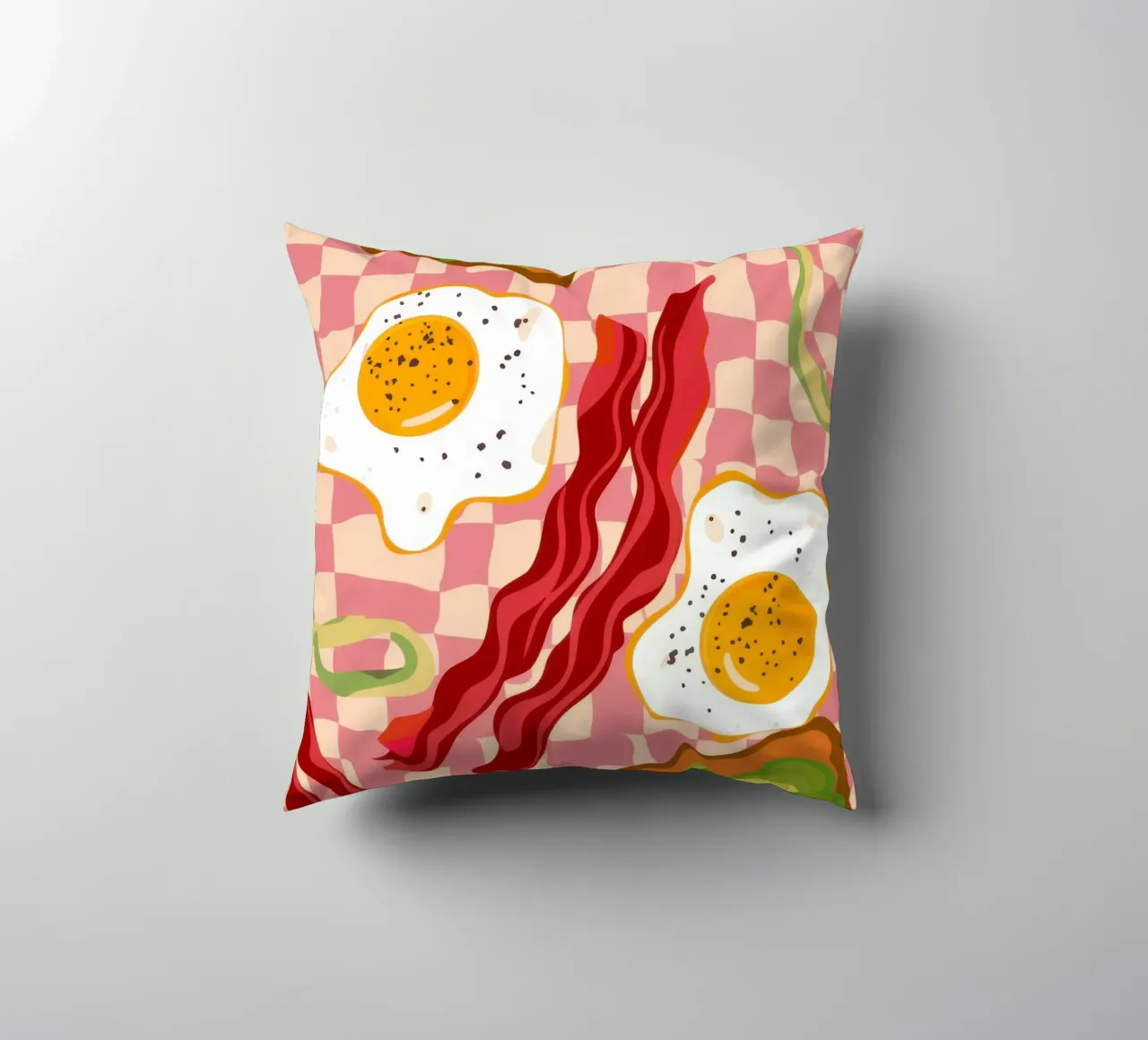 Uova e pancetta a scacchi cuscino da Lyra Glaze