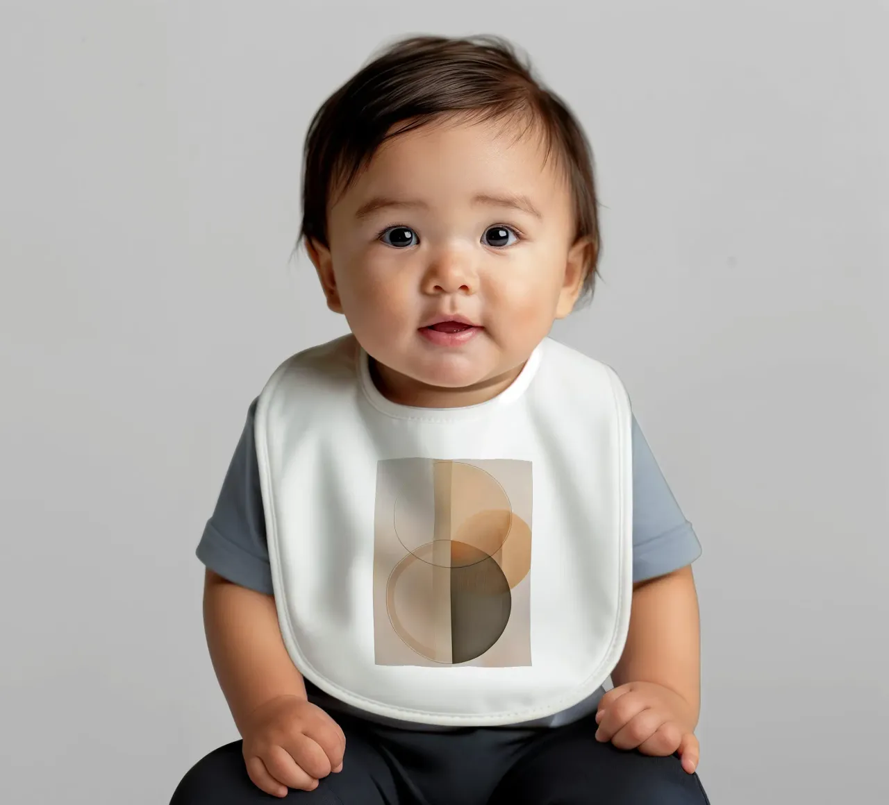Abstract shapes in sand colors baby bib by Imagine