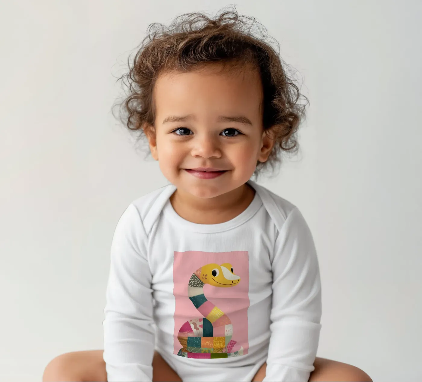 Patchy Python babyrompertje lange mouwen van Kiara