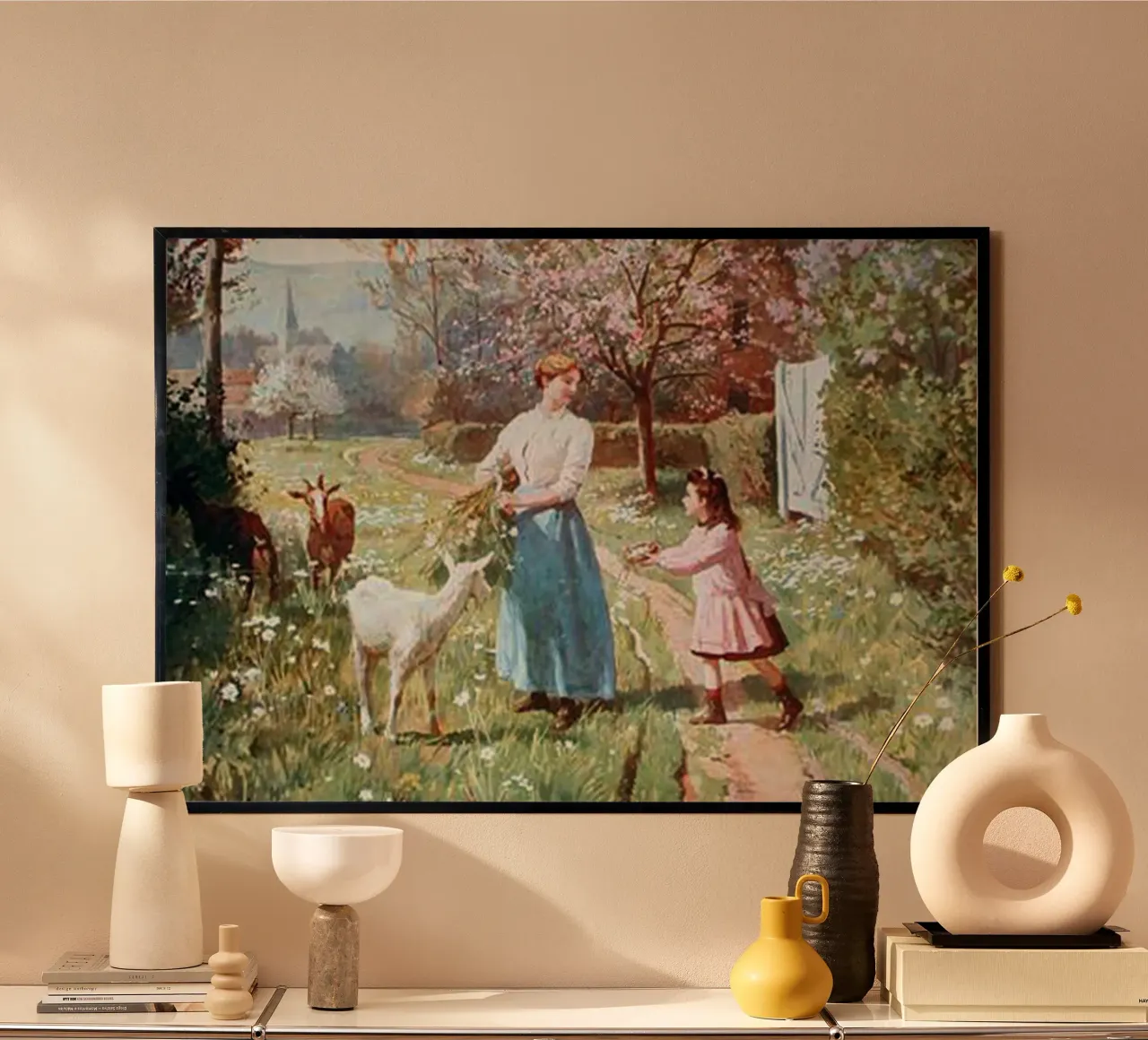 eine Mutter, die ihrer Tochter beibringt, die Ziegen zu füttern Poster mit Holzrahmen von iding store