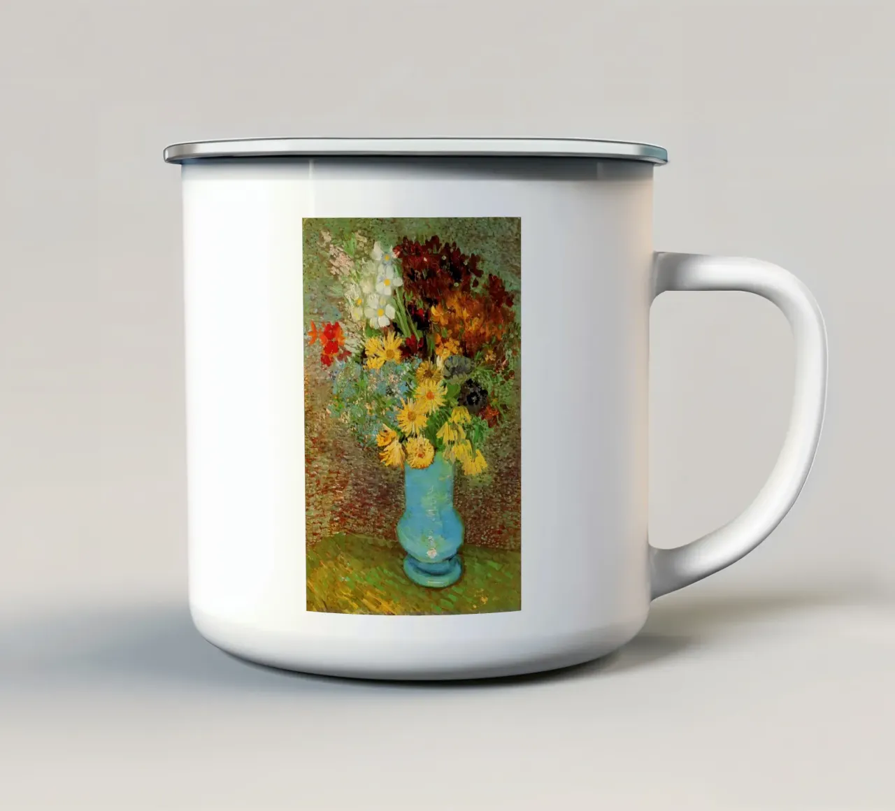 margherite e anemoni in un vaso blu tazza in smalto da Piper Shop Oke