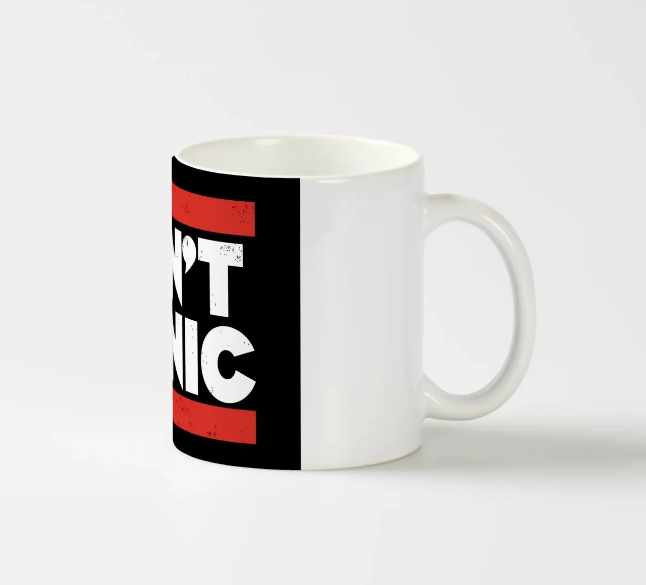 Don't Panic ceramic mug by Mariel Toigo