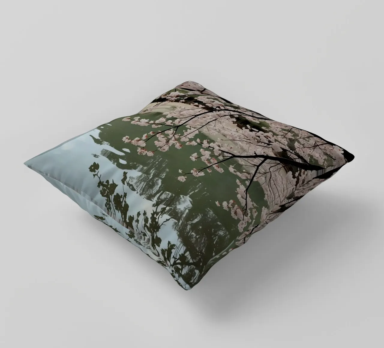 Rami di ciliegio in fiore sull'acqua con riflessi cuscino da DesignDoodle