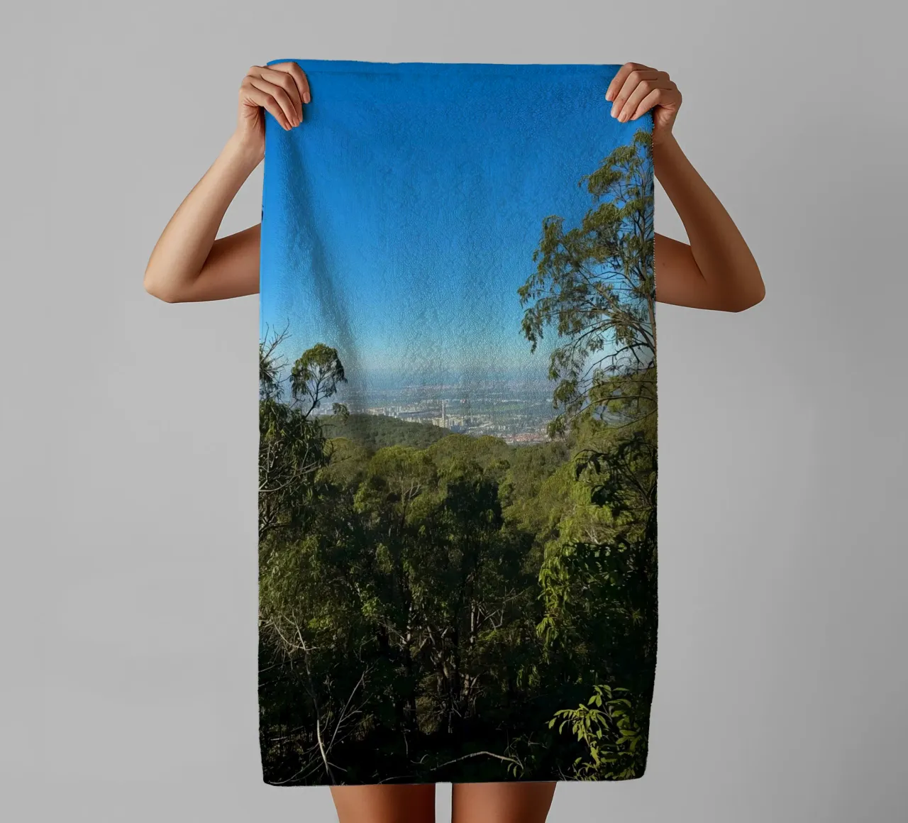 Cityscape View Through Trees towel by DesignDoodle