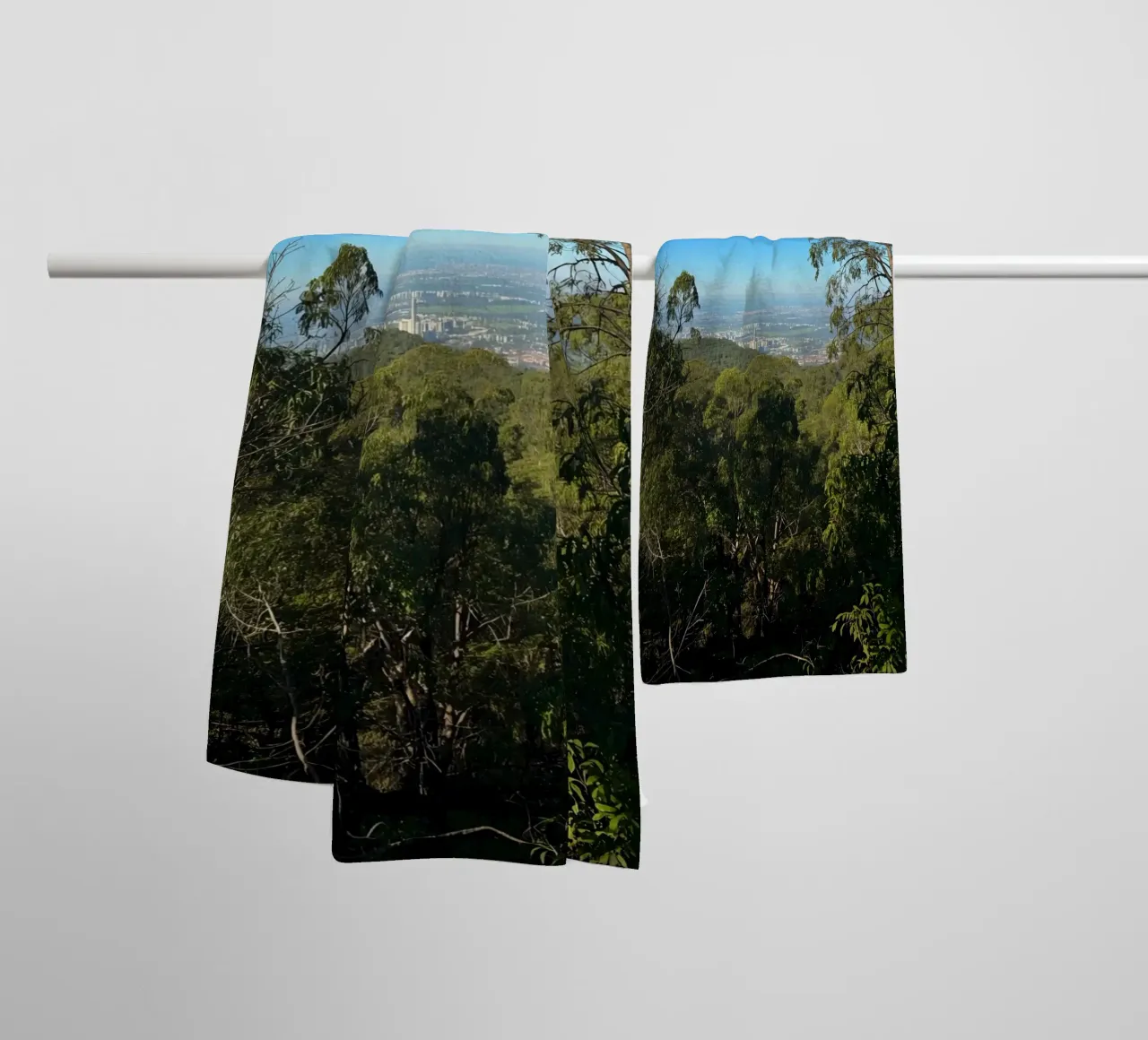 Cityscape View Through Trees towel by DesignDoodle