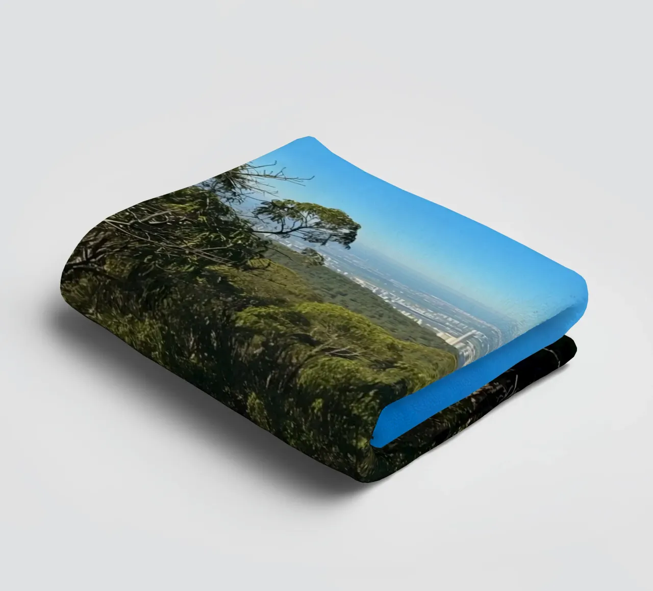 Cityscape View Through Trees towel by DesignDoodle