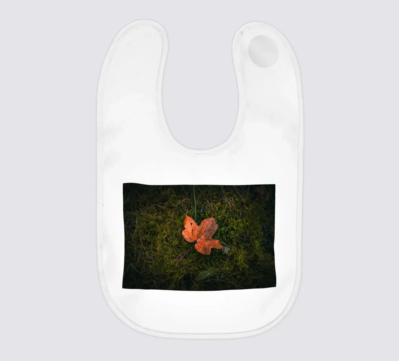 Maple leaf on moss soil baby bib by Marcus Beckert | Fotografie