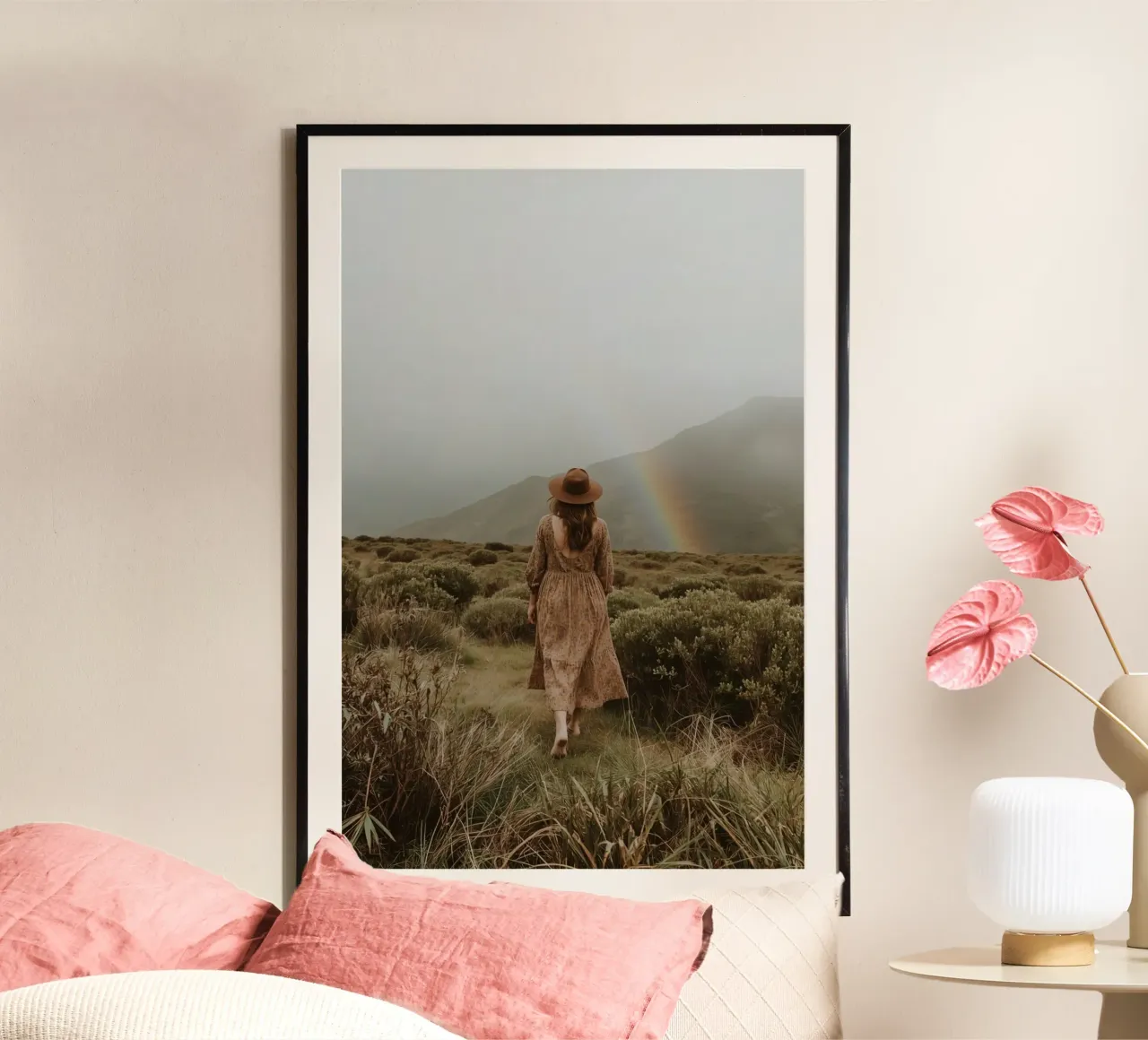 Donna che cammina verso l'arcobaleno in un paesaggio collinare poster da DesignDoodle