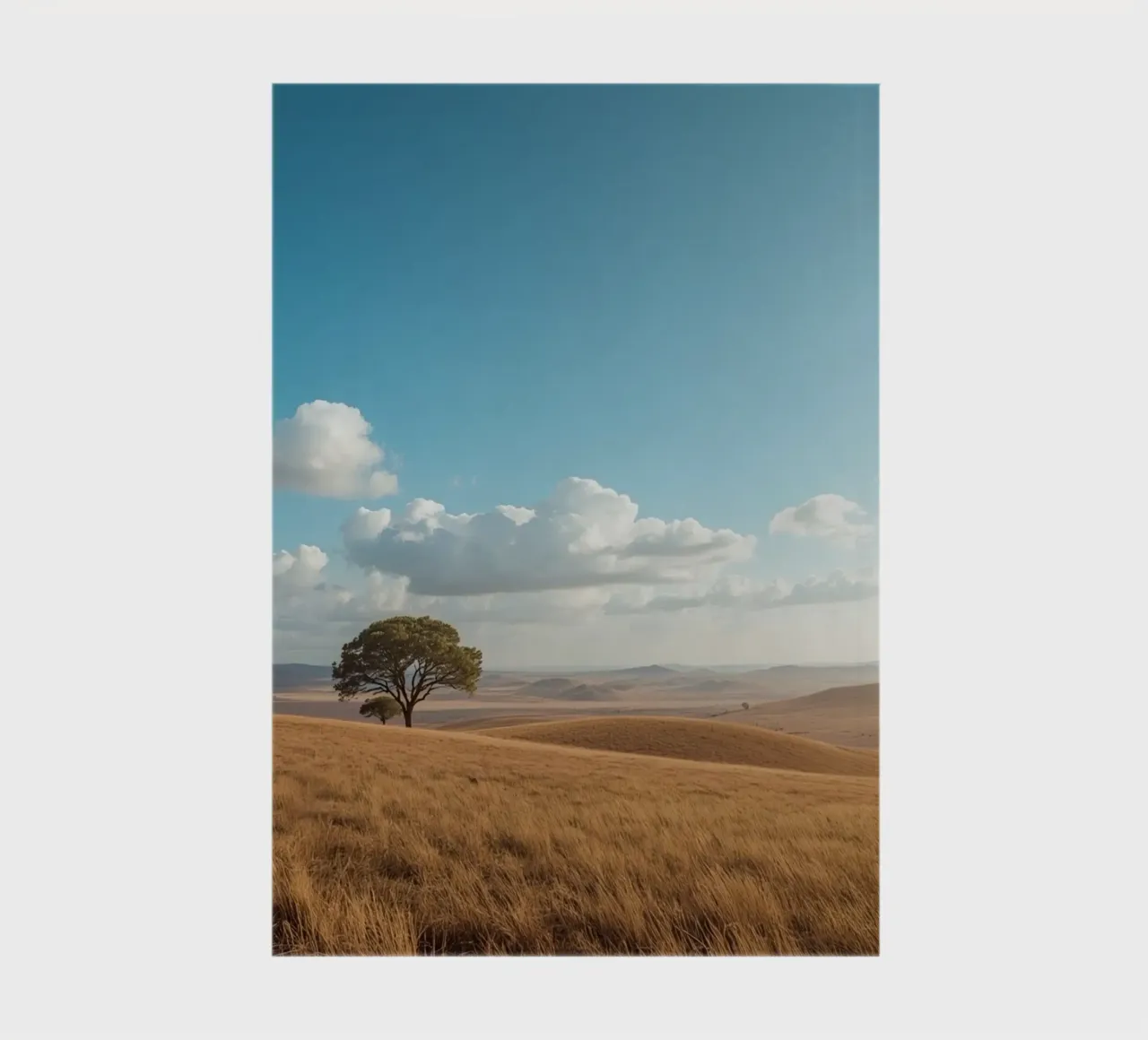 Grass Field with Tree under Cloudy Blue Sky notebook by DesignDoodle
