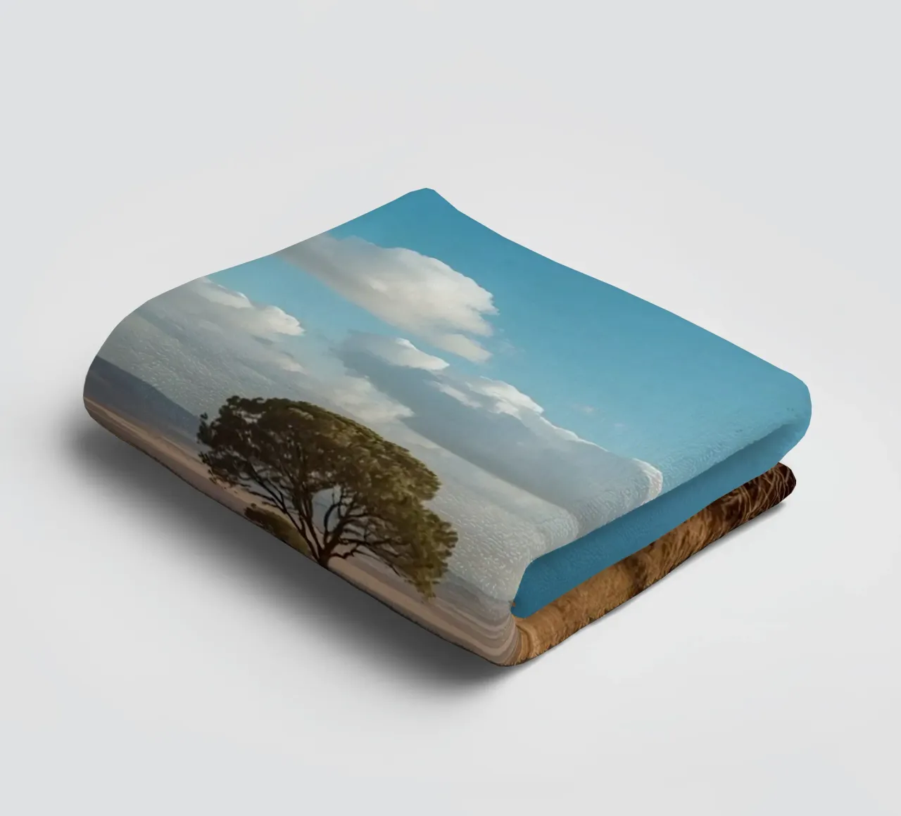 Grass Field with Tree under Cloudy Blue Sky towel by DesignDoodle