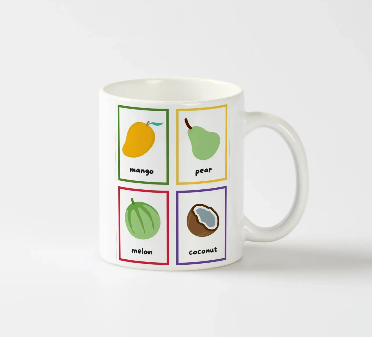 Flashcards sulla frutta_ Mango, pera, melone, noce di cocco tazza in ceramica da Sabine Klein