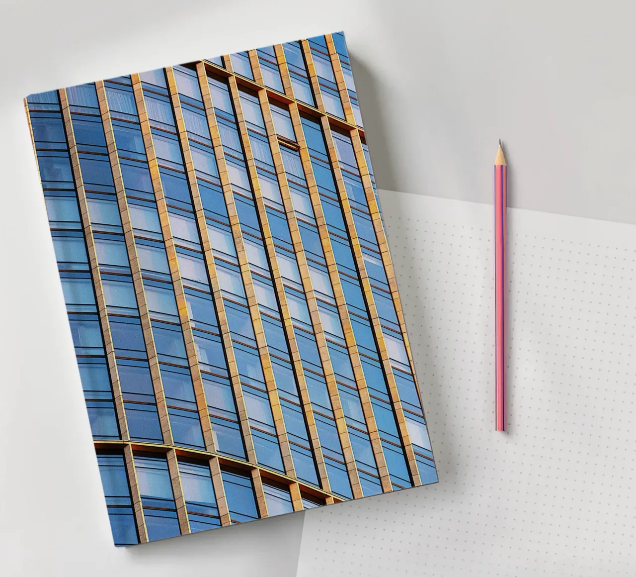 building full of square notebook by Good days