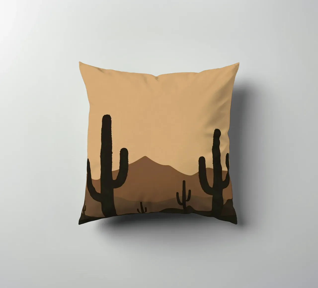 Paesaggio desertico monocromatico con sagome di cactus cuscino da DesignDoodle