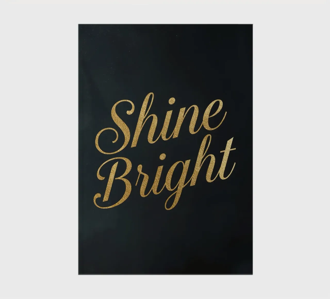 Tilted Golden "Shine Bright" Script on Dark Background notebook by DesignDoodle