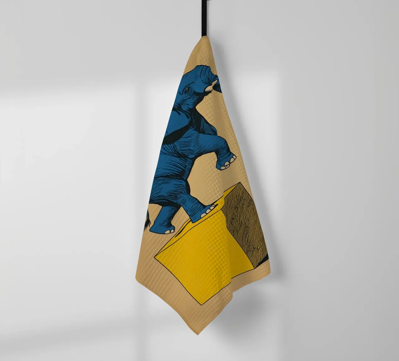 Eléphant bleu en équilibre sur un cube jaune torchon de DesignDoodle