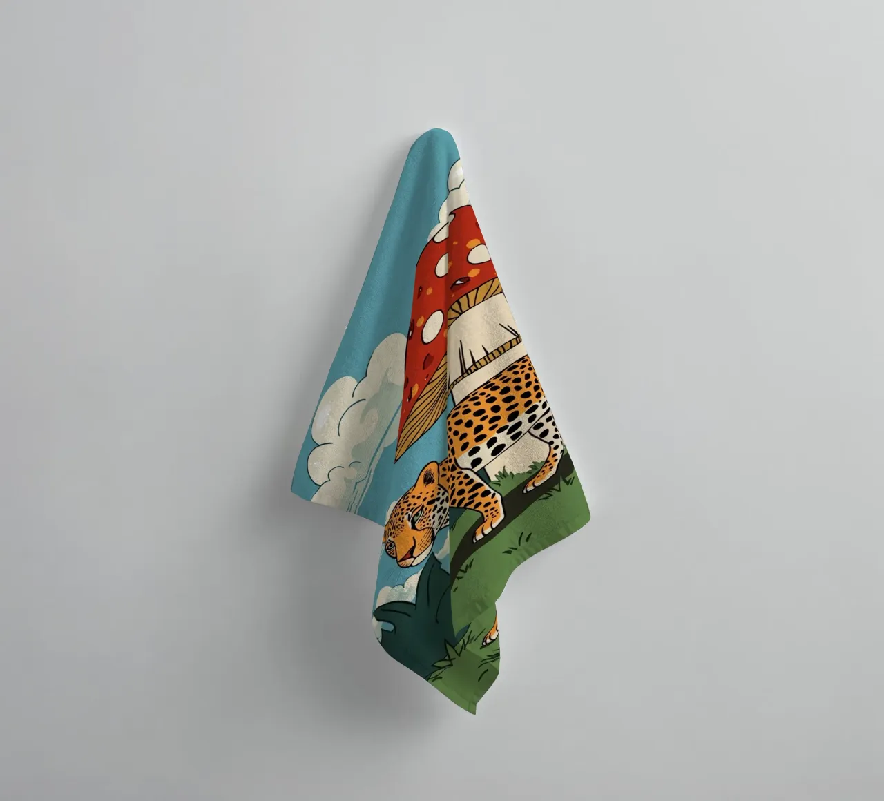 Leopard and Red Mushroom Landscape towel by DesignDoodle