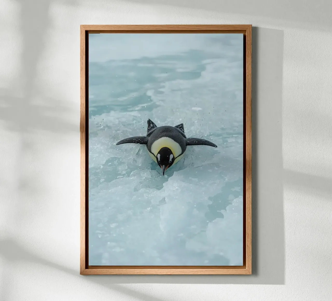 Emperor Penguin Skating in Ice Water canvas with Floater frame by DesignDoodle