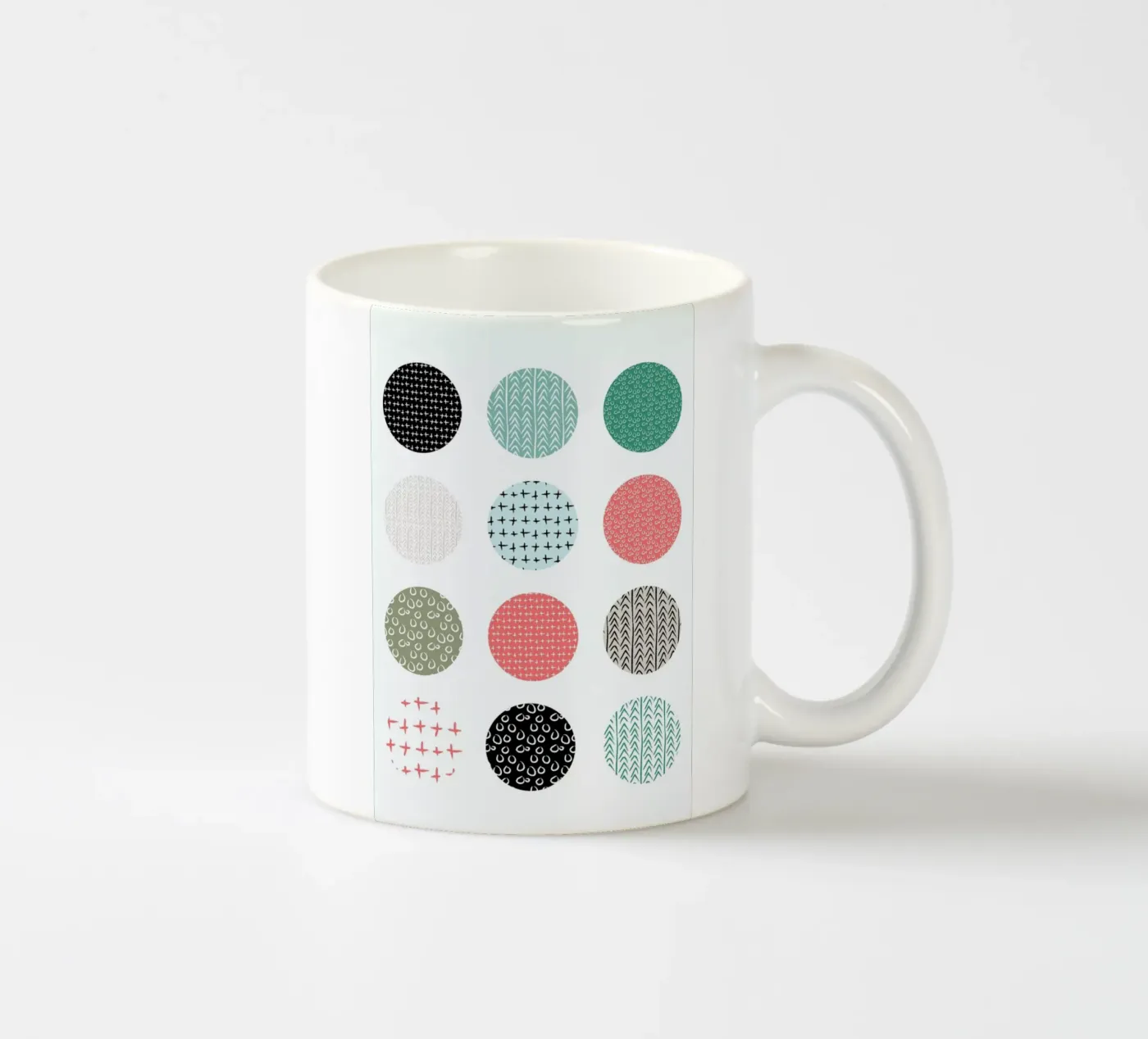 Patterned dots ceramic mug by Maria Kritzas