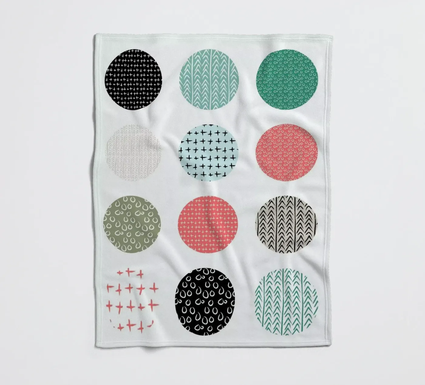 Patterned dots fleece blanket by Maria Kritzas