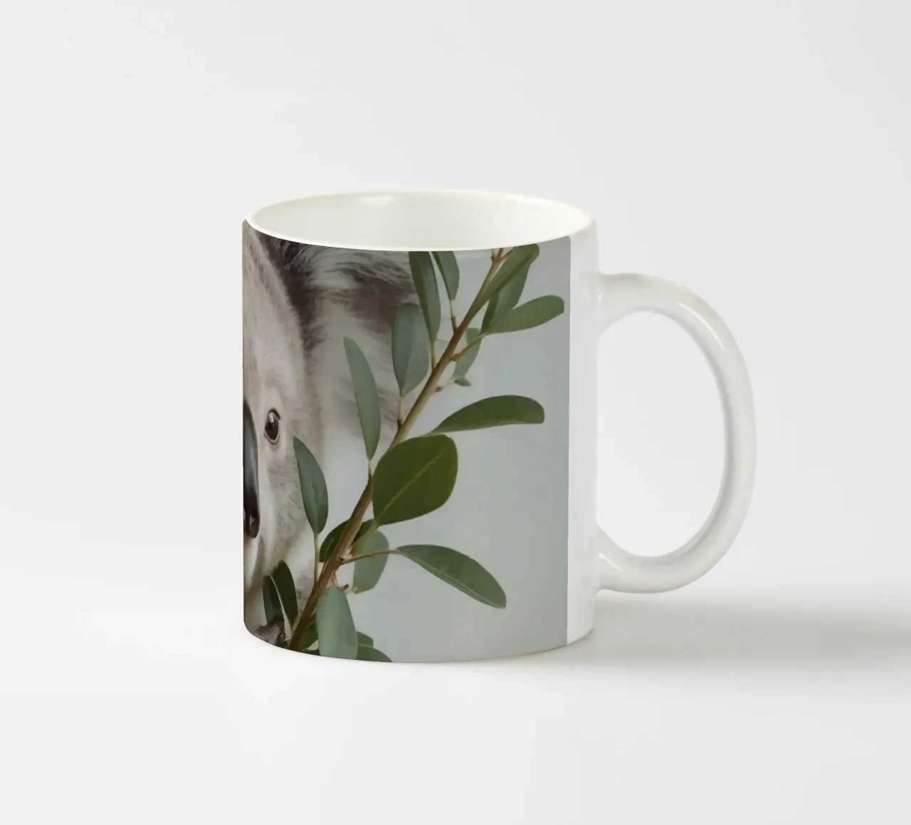 Koala con in mano un ramo di eucalipto tazza in ceramica da DesignDoodle