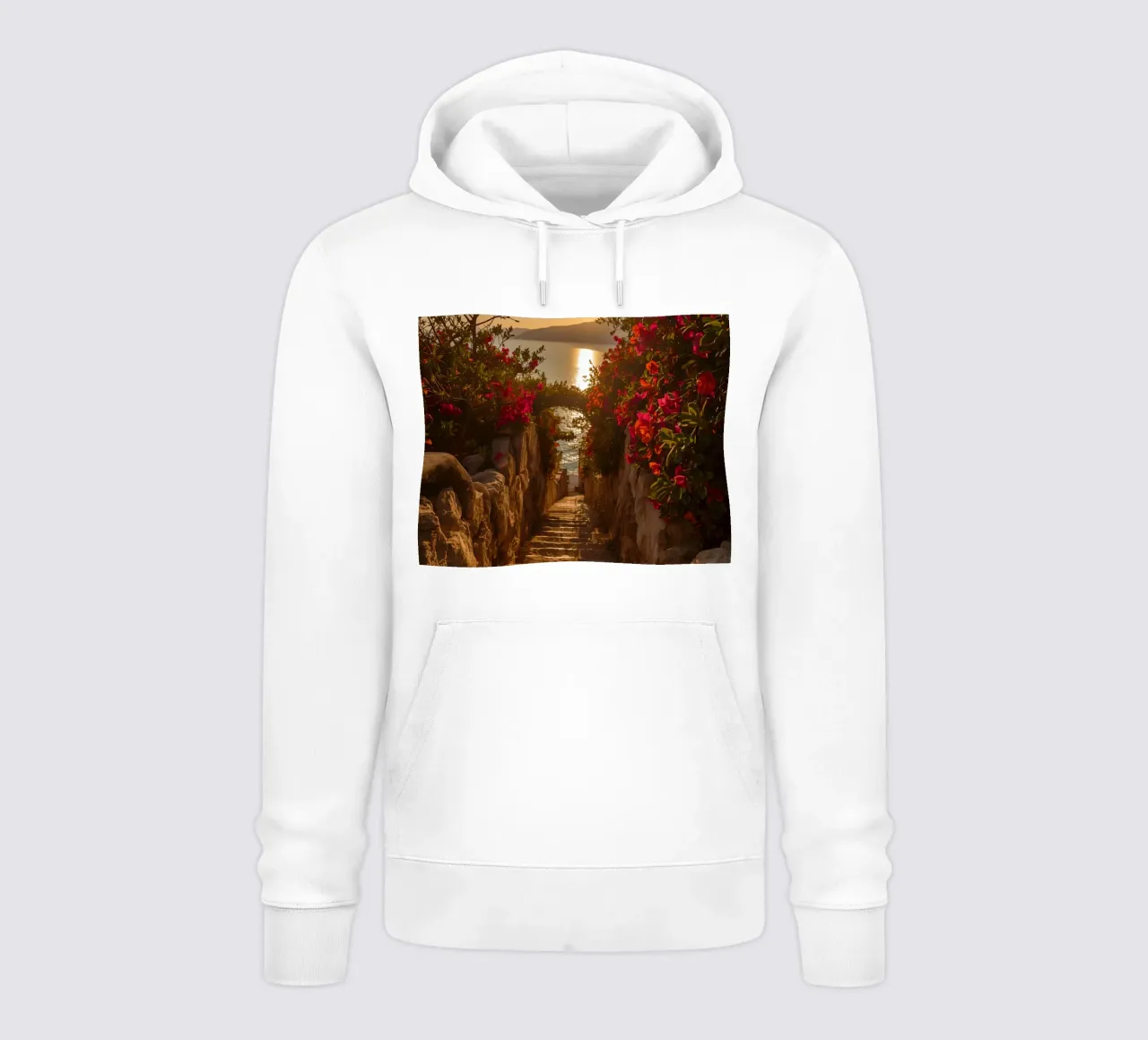 Scala in pietra con fiori che conduce alla vista dell'oceano al tramonto felpa con cappuccio da DesignDoodle
