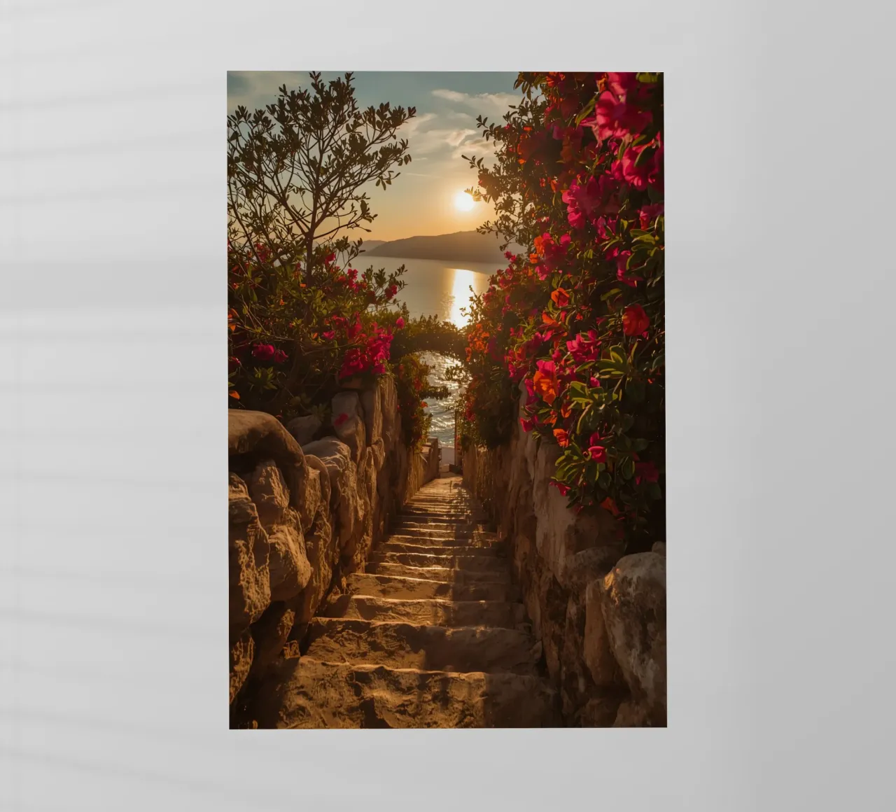 Scala in pietra con fiori che conduce alla vista dell'oceano al tramonto pellicola backlit da DesignDoodle