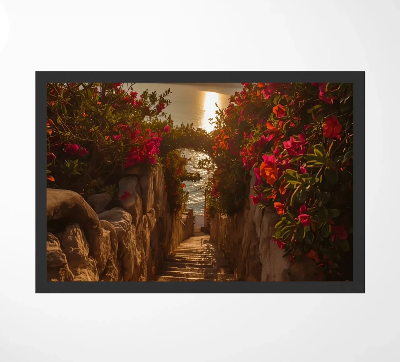 Scala in pietra con fiori che conduce alla vista dell'oceano al tramonto zerbino da DesignDoodle