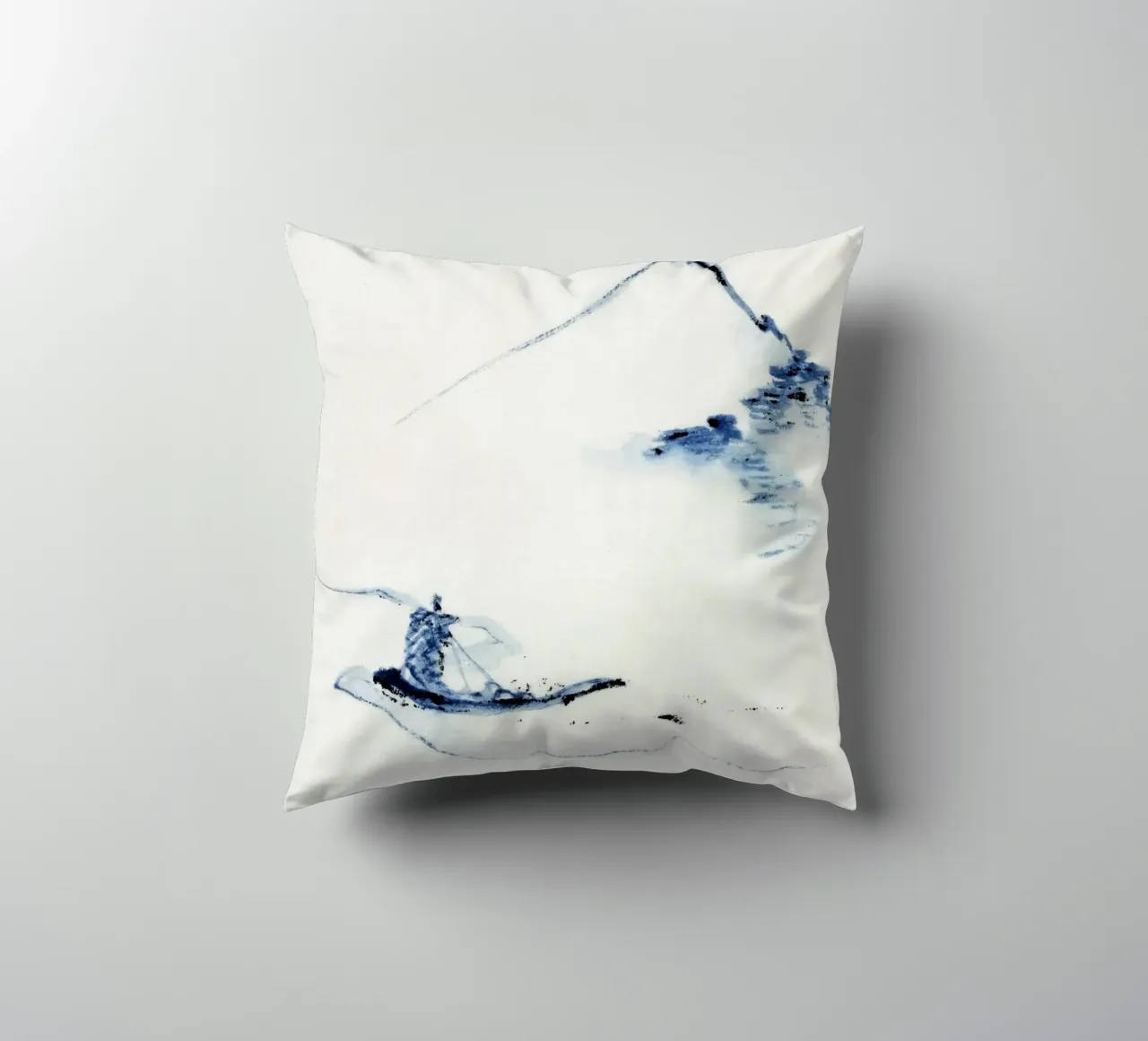 A person in a small boat on a river with Mount Fuji cuscino da vintageshop