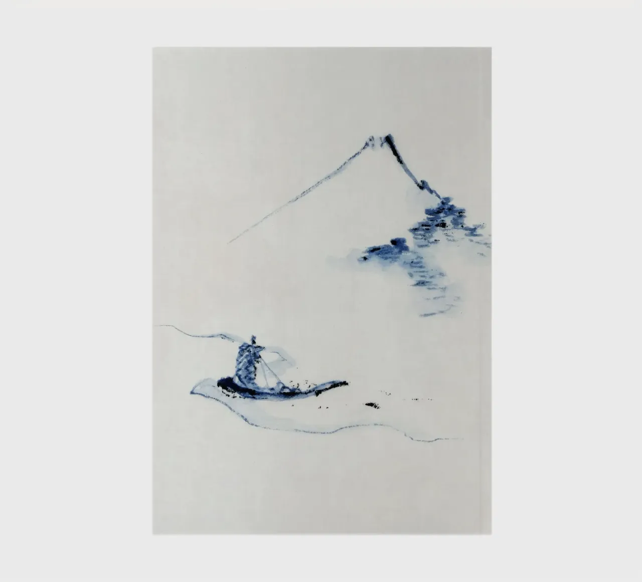 A person in a small boat on a river with Mount Fuji diario da vintageshop