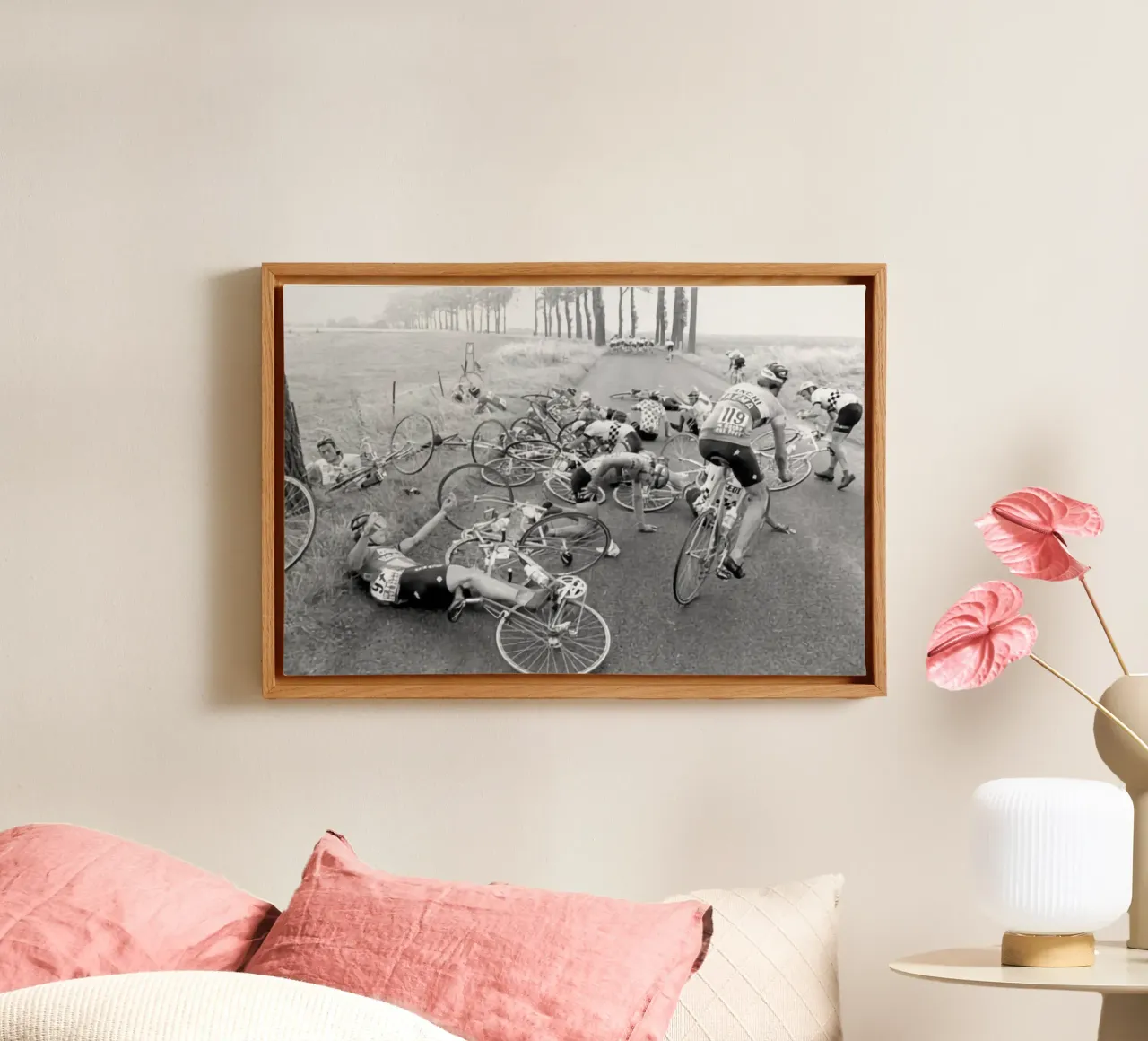 a mass accident involving many cyclists during a road race canvas with Floater frame by addelia shope