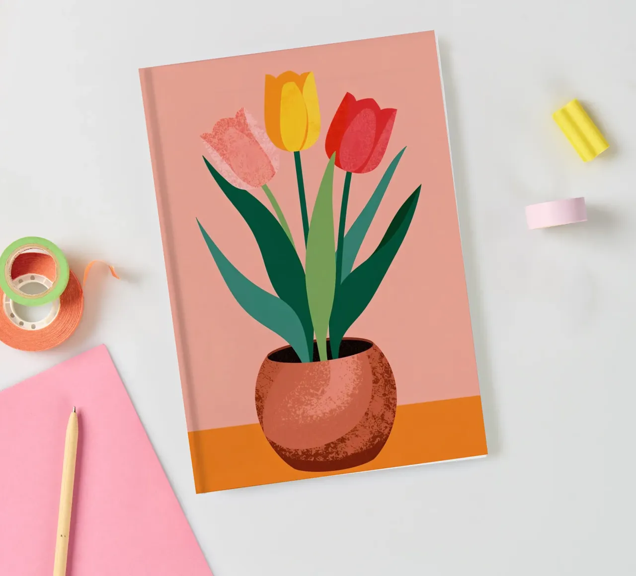 Three Tulips in Pot on Table notebook by DesignDoodle
