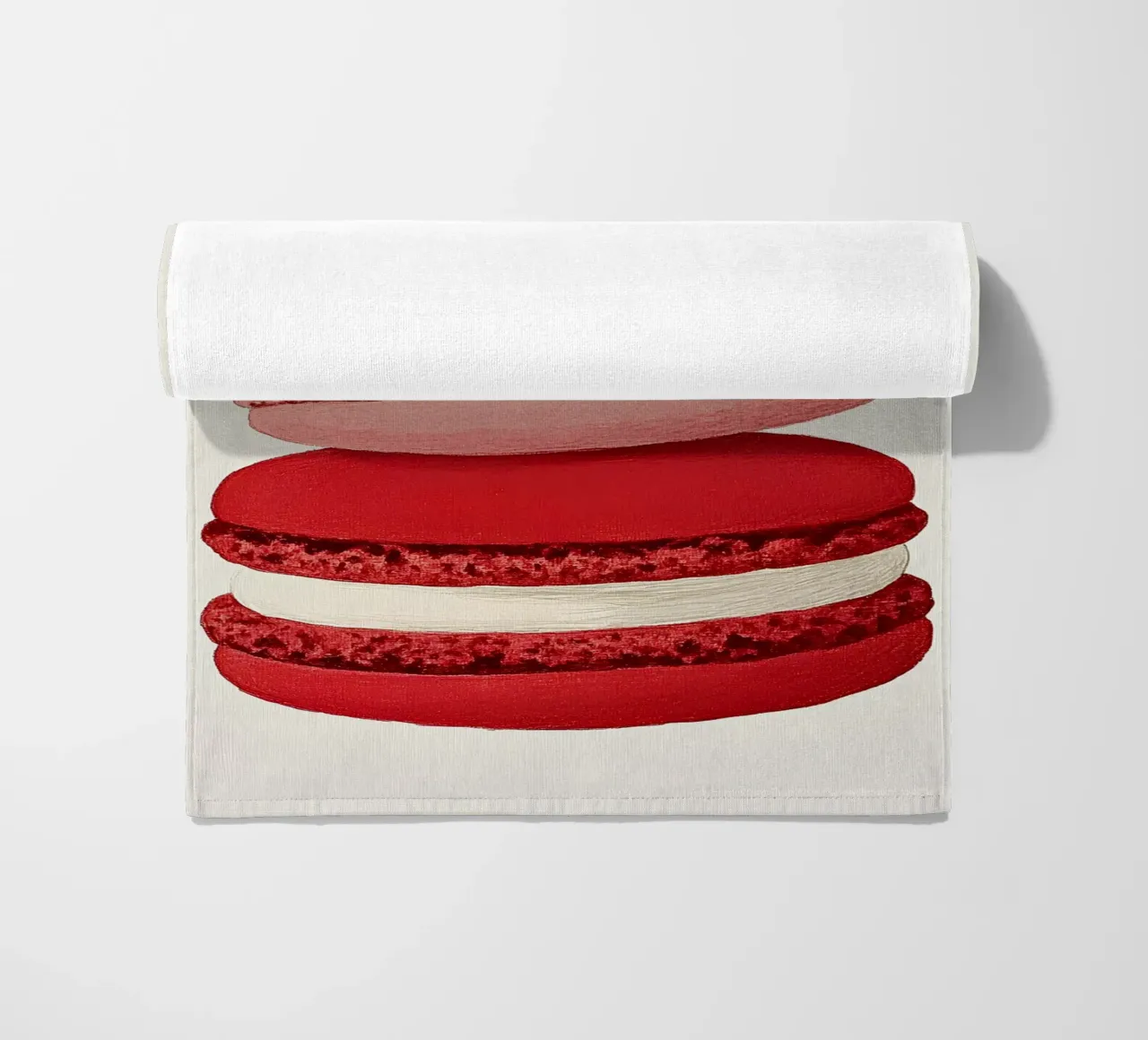 Macarons beach towel by Curious Canvas