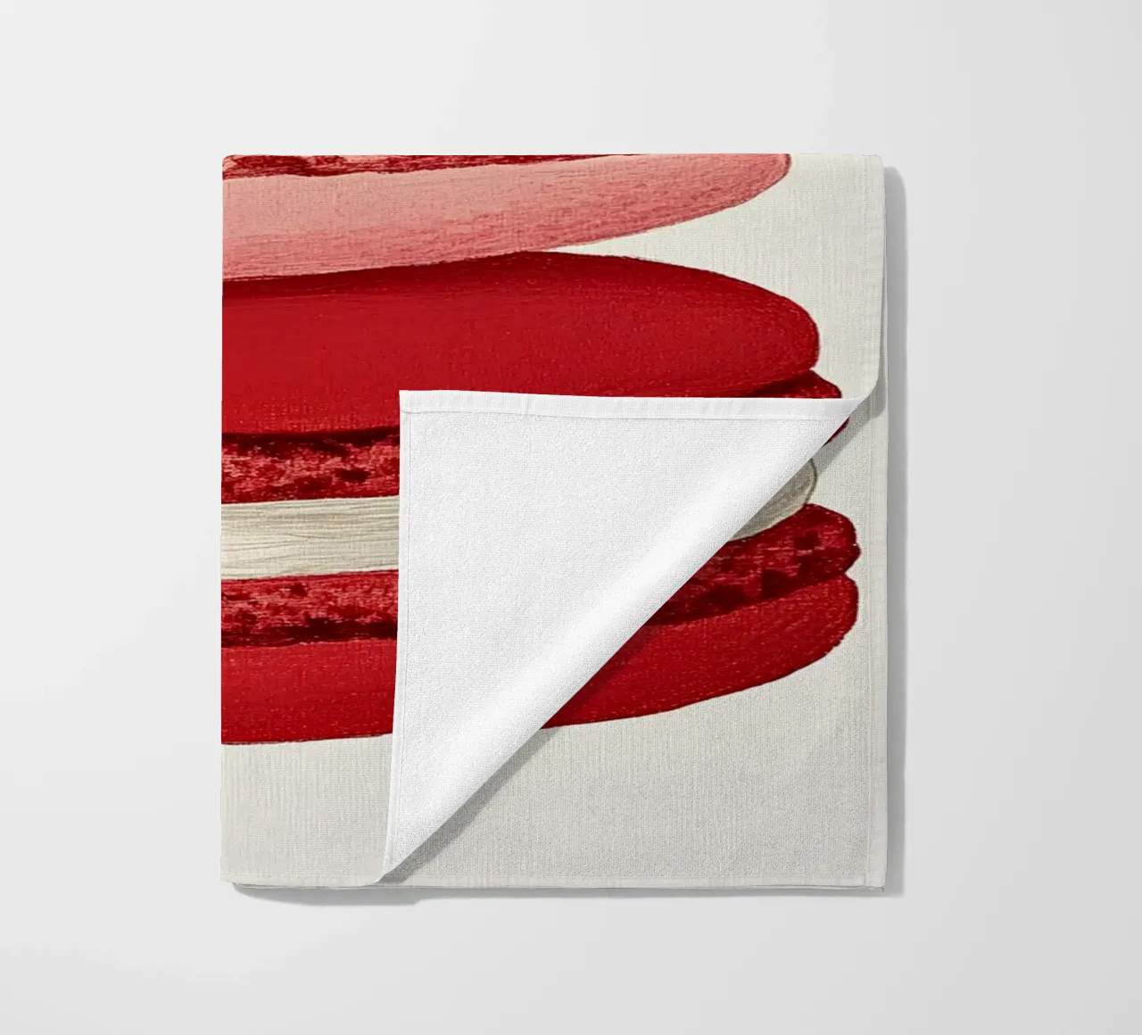 Macarons beach towel by Curious Canvas