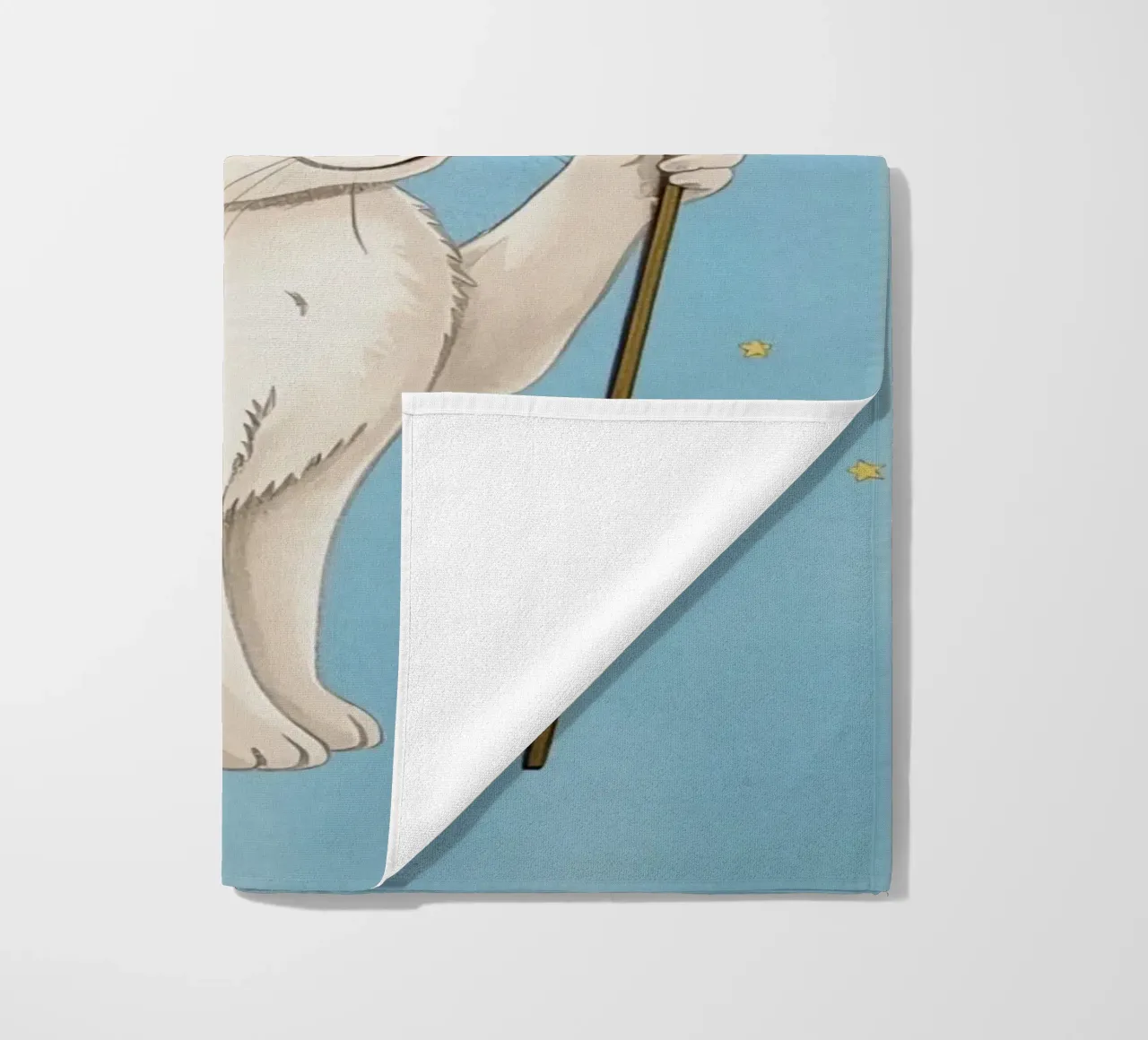 Coniglio bianco con in mano una bacchetta a stella telo mare da DesignDoodle