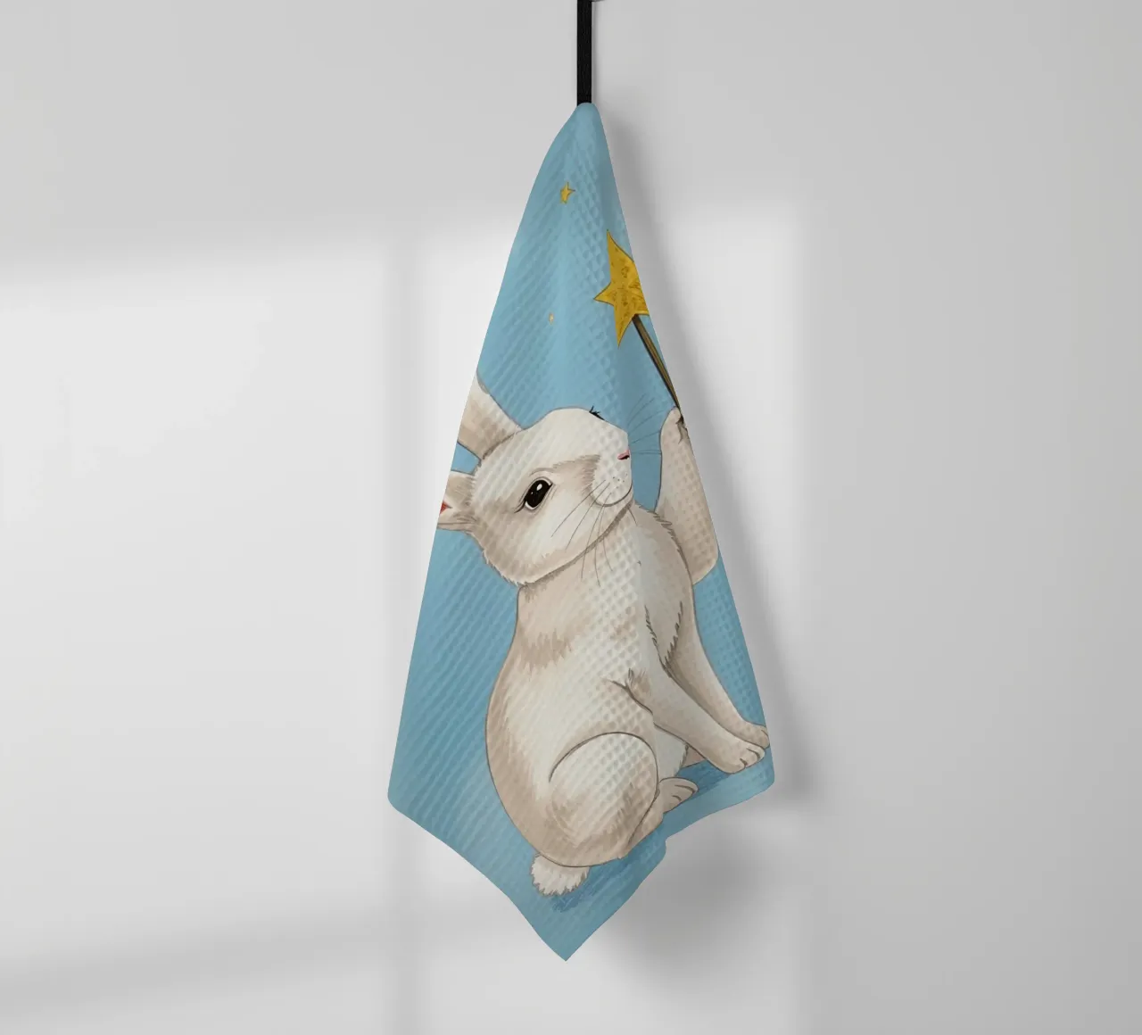 Lapin blanc tenant une baguette étoilée torchon de DesignDoodle