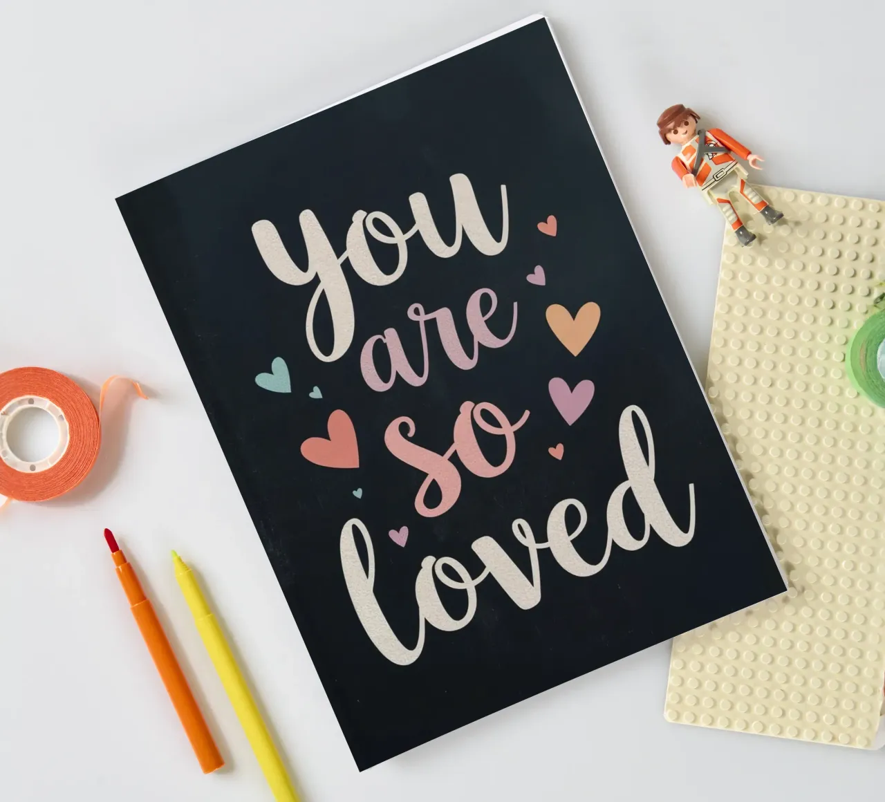 You Are So Loved Text with Hearts on Dark Background notebook by DesignDoodle